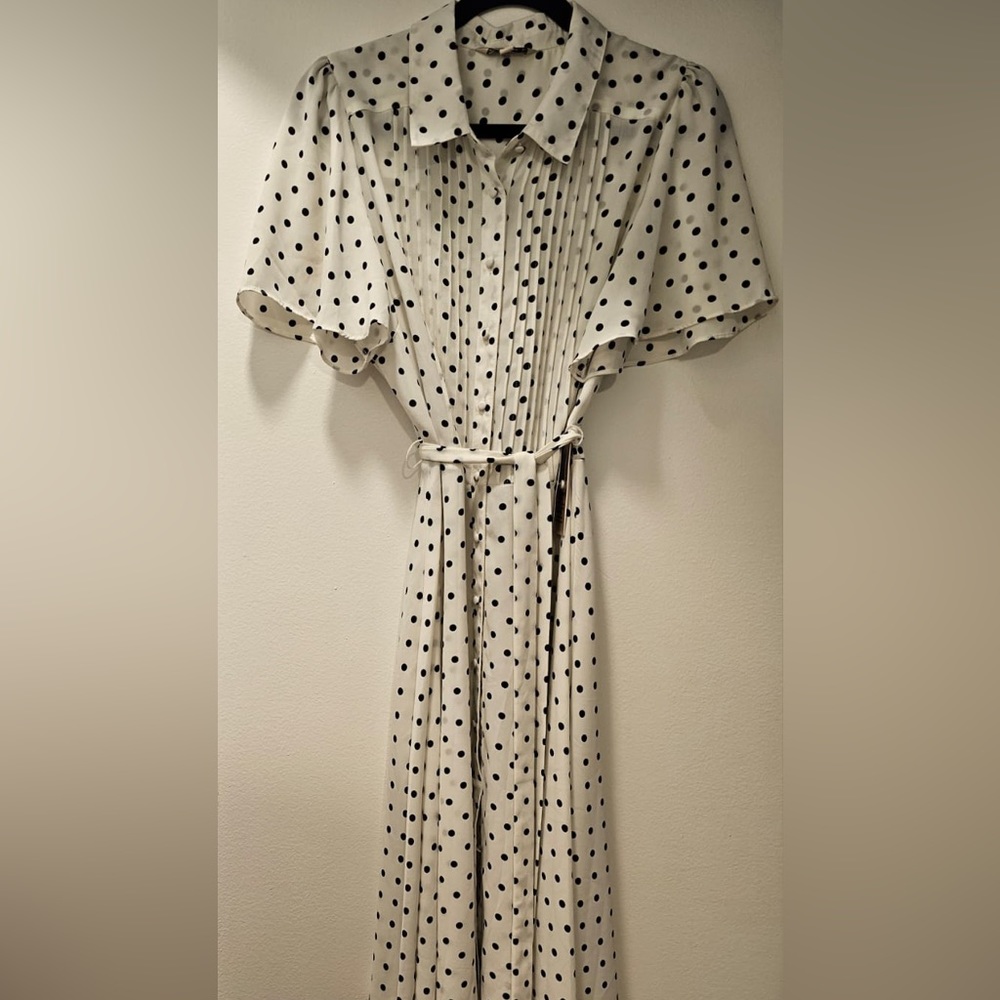 New! Never worn.Collared White/Black polka for dress with sleeves. Gorgeous fit